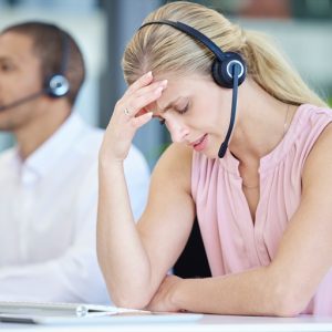 stress-headache-and-call-center-consultant-in-the-2022-12-23-01-00-04-utc